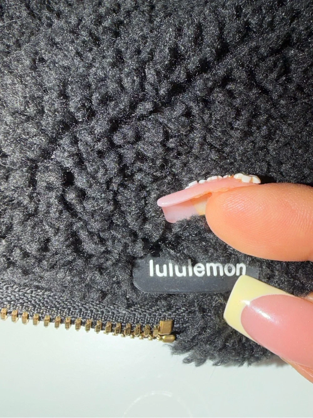 lululemon athletica Black Faux Shearling Belt Bag with Gold Accent